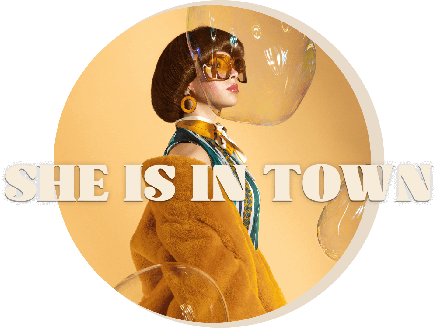 An icon reading "She is in Town" for the Maggie May site